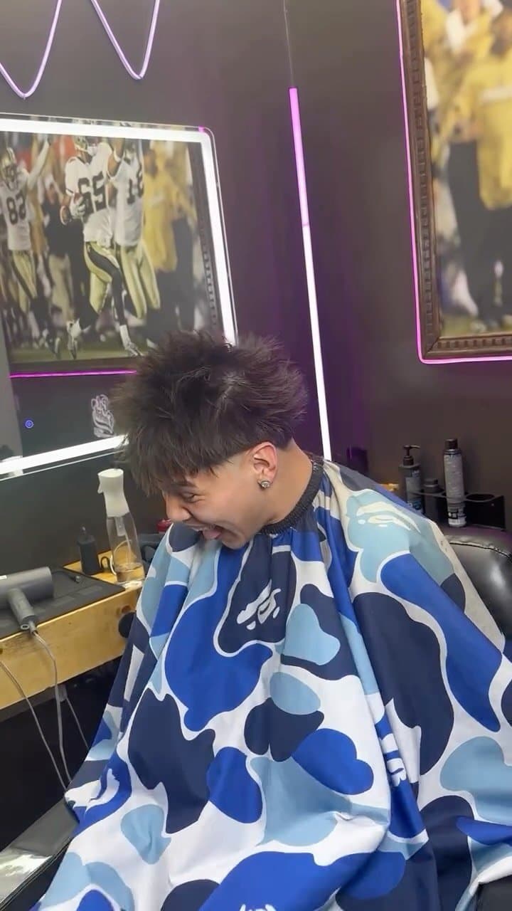 Client laughing in the chair mid-appointment